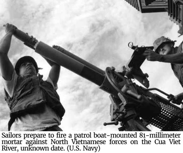 Sailors prepare to fire a patrol boat-mounted 81-millimeter mortar against North Vietnamese forces on the Cua Viet River.
